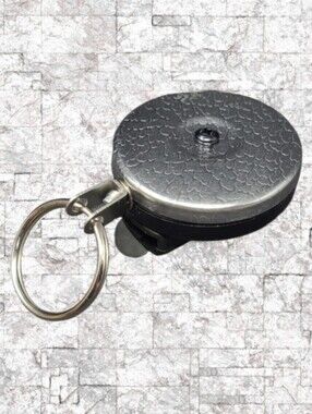 NEW- KEY-BAK ORIGINAL CHROME AND BLACK RETRACTABLE KEY HOLDER - U.S.A.
